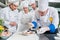 A group of young chefs prepairing meal in luxury restaurant