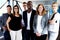 Group of young executives posing for picture