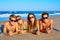 Group of young friends couples portrait in beach