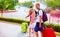 Group of young friends with luggage in airport, ready for the joint trip