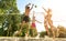 Group young Friends Playing Volleyball On Beach