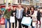 Group Of Young Friends Shopping Outdoors Together