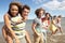 Group Of Young Friends Walking Along