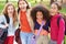 Group Of Young Girls Hanging Out In Park Together