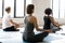 Group of young healthy multiracial diverse people practicing yoga.