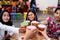 Group of young people cheers drinks