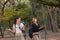 Group of young people hiking trough forest.Outdoors nature concept.