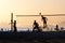 Group of young people playing footvolley on the beach