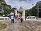 Group of Young people standing at entrance rock or stone of the Gavi Gangadareshwara Temple and a Protected Ancient Monument