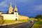 Group of young riders on bicycle ride near by famous castle in Slovakia. Boys are on long trip journey during summer holiday. Spis