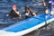 Group of young sup surfers fall from SUP stand up paddle board, women drowning, concept of fail solving problems, team work and
