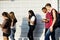 Group of young teenager friends walking home after school