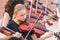 Group of young violinists playing at an outdoor concert