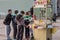 group of youngsters, boys, Serbs, waiting in line in the streets of Valjevo in front of a popcorn stand, or Kocice,