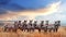 Group of zebras in the African savanna against the beautiful sunset with clouds. Serengeti National Park. Tanzania. Africa.