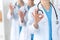 Groupe of medicine doctors show OK or Alright sign closeup. Success and high level service in health care, best