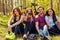 Groupe of people relaxing after bicycle ride in a forest.