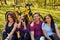 Groupe of people relaxing after bicycle ride in a forest.