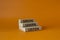 Grow Learn Listen symbol. Concept words Grow Learn Listen on wooden blocks. Beautiful orange background. Business and Grow Learn