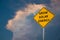 `GROW SOLAR ENERGY` ROAD SIGN AGAINST STORM CLOUDS