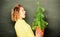 Growing plants in school classroom. surprised student girl with plant at blackboard. school nature study. environmental