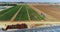 Growing vegetables in greenhouses. Large modern greenhouse. Flight over a large greenhouse. greenhouses aerial view