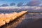 Groyne on shore of the Baltic Sea in winter