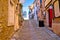 Groznjan cobbled street and old architecture view