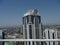 Grozny is the capital of Chechnya. Modern business - city. Panorama of the center of the capital. Top view of the clock.