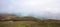 The grren fields of Ennerdale Bridge between the mist