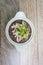 Gruel riceberry in white bowl