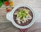 Gruel riceberry in white bowl