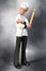 Grumpy Looking Chef Holding A Rolling Pin Portrait Full Length F