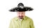 Grumpy middle aged man in Mexico sombrero hat