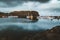 Grundarfjordur, Iceland - 03 January 2019: Harbor with motionless boats during the twilight of the afternoon, Kirkjufell