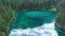 Gruner See, beautiful green alpine lake with crystal clear water in spring