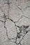 Grunge aged cracked concrete wall surface texture in poor condition