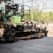 Grunge asphalt paving machines