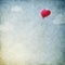 Grunge background with heart balloon