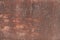 Grunge background, old metal sheet, weathered very rusted steel, red color metal, textured surface, outdoor material, close-up