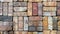 Grunge background texture of old worn colorful bricks