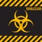 Grunge biohazard background. Yellow biohazard symbol on black background