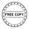 Grunge black free copy word round rubber stamp on white background
