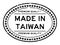 Grunge black premiumq quality made in Taiwan oval rubber business stamp on white background