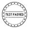 Grunge black test passed word round rubber stamp on white background
