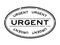 Grunge black urgent word oval rubber stamp on white background