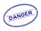 Grunge blue danger word oval rubber stamp on white background