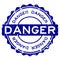 Grunge blue danger word round rubber stamp on white background