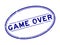 Grunge blue game over word oval rubber stamp on white backgoround