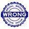 Grunge blue wrong word round rubber stamp on white background